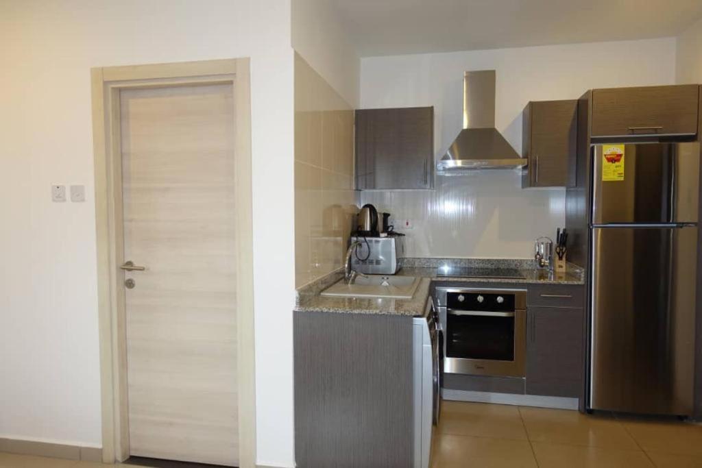 The Gallery Luxury Suites Cpg 东勒贡 外观 照片
