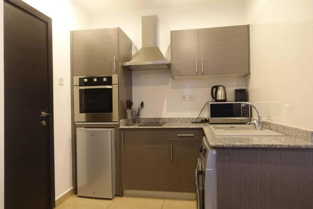 The Gallery Luxury Suites Cpg 东勒贡 外观 照片