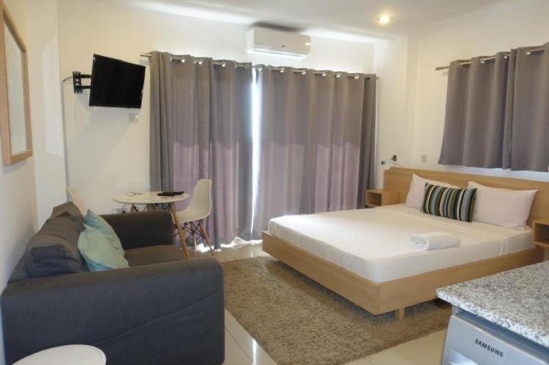 The Gallery Luxury Suites Cpg 东勒贡 外观 照片